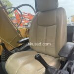 CAT320DL SEAT IN THE DRIVER ROOM